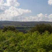 A mocked-up photo showing what the proposed turbines could look like from Duncryne Hill if planning