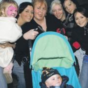 The McLaughlin family enjoy the Christmas light switch on