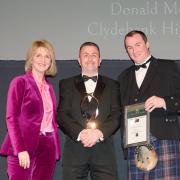 School Chef of the Year Donald McInnes of Clydebank High School with (right) Kevin Simpson of category sponsor Inspire Catering and event host, BBC presenter Kaye Adams