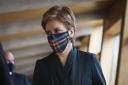 Nicola Sturgeon wearing a tartan facemask. Credit: PA