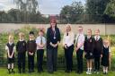 Headteacher Lindsay Thomas, education convener Clare Steel and some of the Linnvale pupils celebrate the positive report