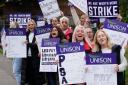 Unison members on strike (Jane Barlow/PA)