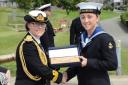 In recognition of being the Navy’s top reservist, Sandi, pictured right above, was presented with the MacRobert Trust’s Boatswain’s Call Award from Commodore of the Maritime Reserves, Commodore Jo Adey, at the Accelerated Rating Programme Pass out