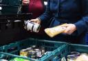Stock image of food parcels at a food bank.