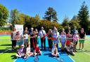 Councillor David McBride cut a red ribbon on Thursday [June 15] officially opening the new courts at Whitecrook Park