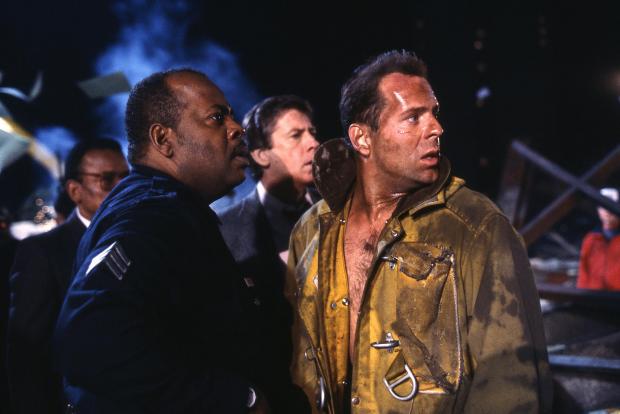 Clydebank Post: Reginald VelJohnson and Bruce Willis in Die Hard. Credit: Disney 