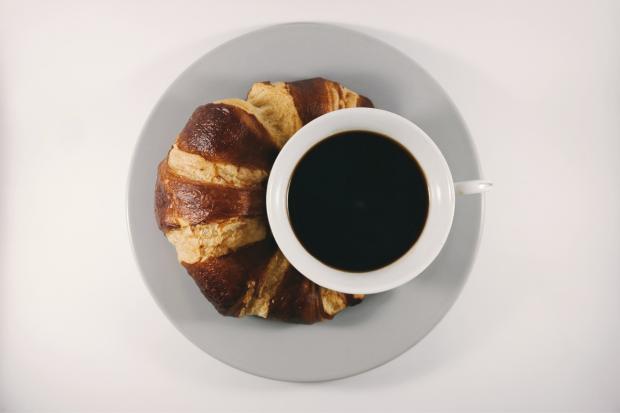 Clydebank Post: Coffee with a croissant. Credit: Canva