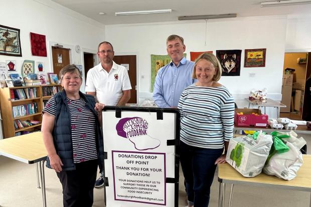 Pictured are Mary McGinley, Helensburgh and Lomond Foodbank chair and volunteer; Darren Pearce, warrant officer; Hamish Fowler, Babcock’s director of fleet operations at Clyde; and Louise Robson, Helensburgh and Lomond Foodbank volunteer.