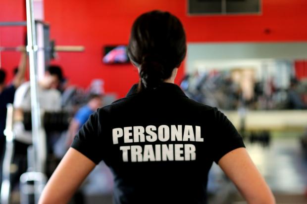 Clydebank Post: A personal trainer. Credit: Canva