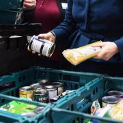 Stock image of food parcels at a food bank.