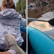 Pair row down flooded Glasgow street offering 'ferry service' to shops