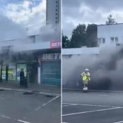 Fire crews race to battle blaze at shopping centre
