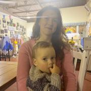 Natalia Lutsyk and her youngest son pictured at Old Kilpatrick Food Parcels - their “second family”
