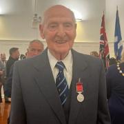 Peter Dempster was decorated at a ceremony in Clydebank Town Hall on May 17