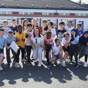 Primary five pupils who organised the event pictured with Cllr Eva Murray who popped along to support the children