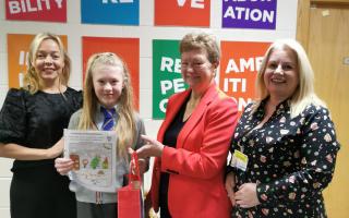 (Pictured L to R) Head Teacher Jane Crombie, Winner Maddisyn McKinlay, Chair of NHS 24 Public Partnership Forum Anne MacDougall, and NHS 24 Head of Clinical Services Nicola Paterson