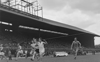 Jim Wotherspoon crossing the line at the 1948 British Police Sports at Hampden