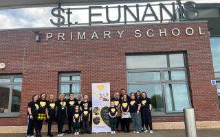 Members of staff at St Eunan's Primary School are taking on the Kiltwalk on Sunday, April 28 in aid of local childhood cancer charity Caleb's Trio of Hope