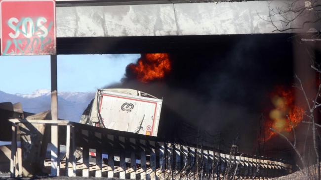 A tanker fire on the A21 motorway between Brescia and Turin (Filippo Venezia/ANSA/AP)